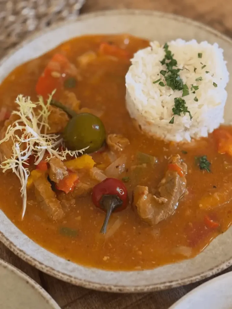 Dish from the lunch menu served with rice in a restaurant in Plzeň